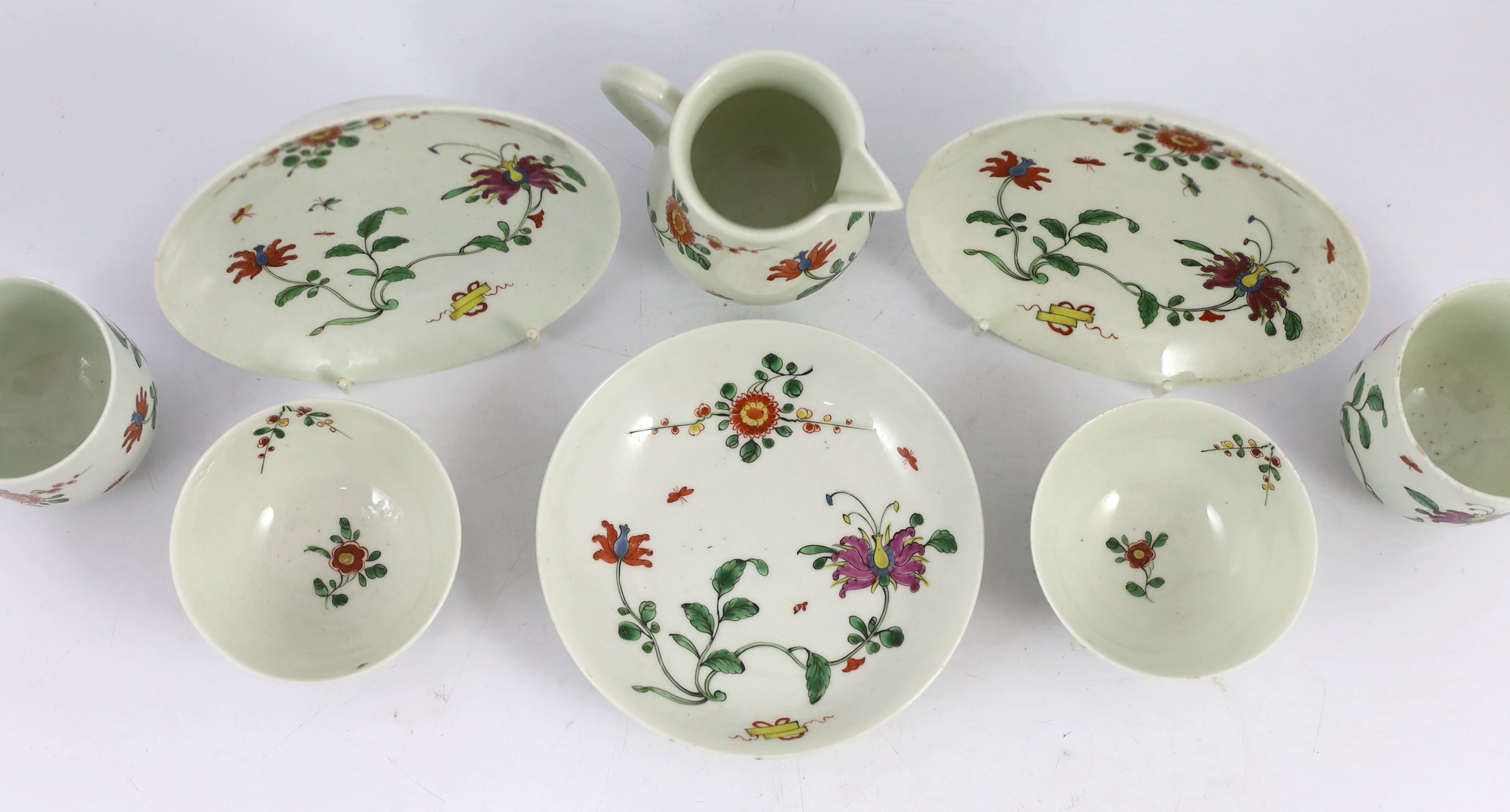 A Worcester ‘Honeysuckle’ pattern part tea and coffee set, c.1755-60, slight faults